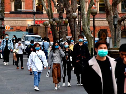 The death, a man in his 80s with underlying health conditions, marked a grim milestone for the country which has had to pause some parts of a staged reopening after nearly two years of stop-start lockdowns.