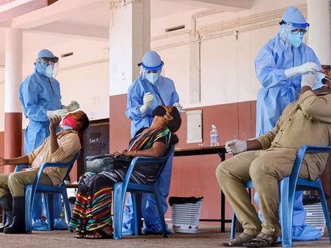 File picture: Health workers collect samples from corporation workers for COVID-19 test, during Unlock 2.0, at a school in Kozhikode, Kerala. 
