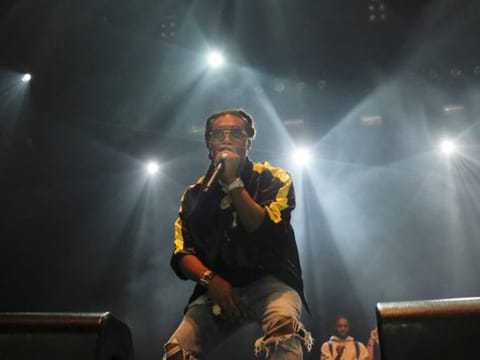 Takeoff, from the hip-hop trio Migos.