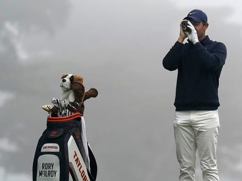 Rory McIlroy surveys the course at Harding Park