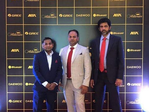 Rahul Sangole (left) with his friends Suhail and Israt, who pooled the money to buy the DDF ticket. Wednesday's DDF raffle was won by Sangole and 10 of his friends.
