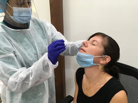 Szilvia Marosi undergoes a PCR test for Covid19 in Dubai
