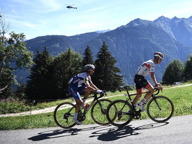 Team Deceuninck riderJulian Alaphilippe and Team UAE Emirates' David De la Cruz climb during the fourth stage of the 72nd edition of the Criterium du Dauphine 
