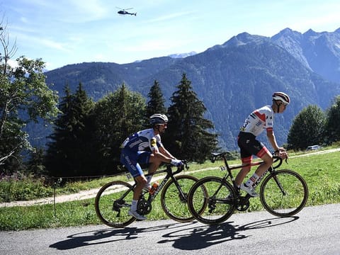 Team Deceuninck riderJulian Alaphilippe and Team UAE Emirates' David De la Cruz climb during the fourth stage of the 72nd edition of the Criterium du Dauphine 