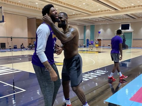 Anthony Davies and Lebron James share a joke during LA Lakers training in Orlando