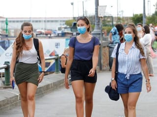 In Pictures: Italy mandates masks as coronavirus case numbers rise again among young
