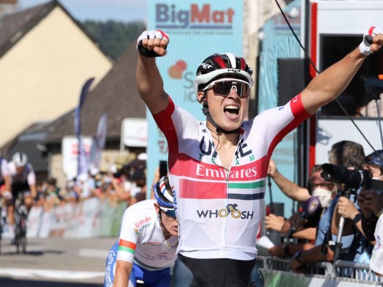 UAE Team Emirates' Jasper Philipsen celebrates the Stage 3 win on the Tour Du Limosin