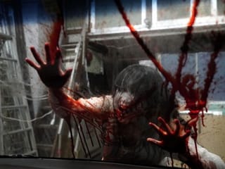 Look: No fear of coronavirus at this drive-through haunted house