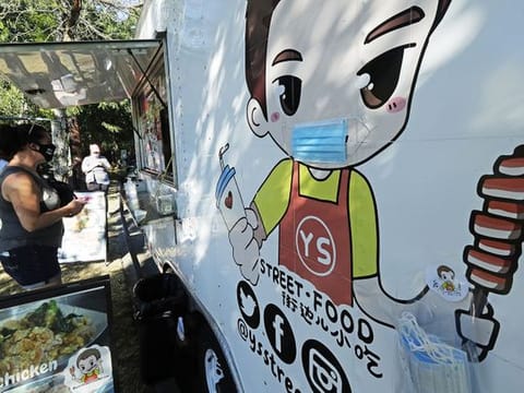 Food trucks hit by virus find new foodies
