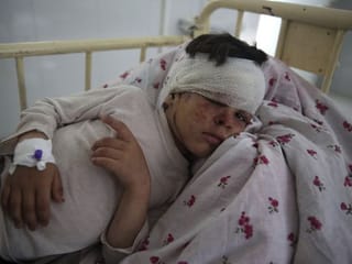 Rescuers scour mud-clogged debris for Afghan flood victims; 150 dead