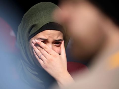 A family member of a victim cries in the court on the last day of the sentencing of Australian white supremacist who murdered 51 Muslims in last year's New Zealand mosque shooting 