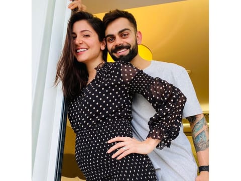 Virat Kohli and wife Anushka Sharma show off the bump