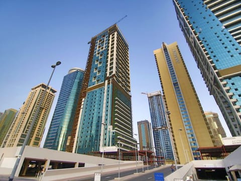 The Dubai skyline and residential towers at Jumeirah Lakes Towers. 