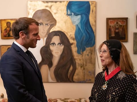 Macron meets with Lebanon's diva Fairuz, one of the Arab world's most popular singers, in Rabieh, north Beirut on August 31, 2020. 