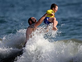 Crowds pack beaches as California bakes in the weekend heatwave
