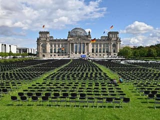 13,000 chairs outside German parliament in Greek migrant camps protest