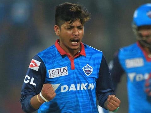 Delhi Capitals bowler Sandeep Lamichhane of Nepal celebrates after dismissing Kings XI's Chris Gayle during the 2019 Indian Premier League. 