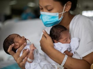 Photos: Fear and resolve at Philippine maternity hospital amid COVID-19