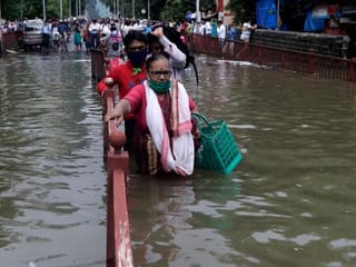 In Pictures: Rains lash Mumbai; traffic disrupted, trains cancelled