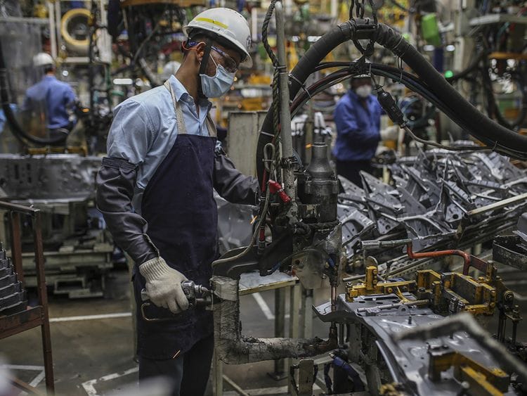 Stock India economy car factory