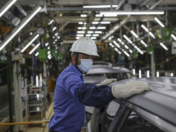 Stock India economy car factory