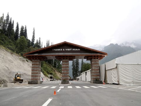A view shows the south portal gate near the newly constructed Atal Tunnel. Engineers are re-testing the automated lighting and ventilation systems, fire hydrants, pumps, phones and various sensors for fitting inside the tunnel before the inauguration.