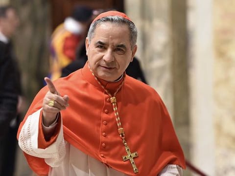 In this file photo taken on June 28, 2018, newly elevated cardinal, Giovanni Angelo Becciu from Italy, attends the courtesy visit of relatives following a consistory for the creation of new cardinals on June 28, 2018 in the Apostolic Palace at St Peter's basilica in Vatican. Cardinal Angelo Becciu, the head of the vatican's saint-making office, resigned, the Vatican said in a statement on September 24, 2020. 