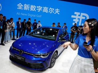 Crowds in face masks pack out China auto show after COVID-19 delay