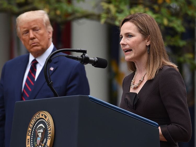 Judge Amy Coney Barrett speaks after being nominated to the US Supreme Court by President Donald Trump in the Rose Garden of the White House in Washington, DC.  Federal judges are nominated by the president for life and can only be removed by being impeached by the House of Representatives for "high crimes or misdemeanors" and convicted by the Senate.