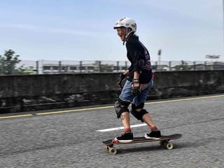 63-year old cancer survivor takes up longboard on road to recovery