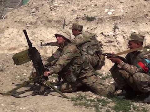 An image grab taken from a video made available on the official web site of the Azerbaijani Defence Ministry on September 28, 2020, allegedly shows Azeri troops conducting a combat operation during clashes between Armenian separatists and Azerbaijan in the breakaway region of Nagorno-Karabakh. 