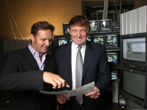 Mark Burnett, left, creator and producer of the reality show "The Apprentice," with the star of the show Donald Trump in the control room for the TV series at Trump Tower in New York, Sept. 22, 2003. Tax records show that “The Apprentice” rescued Donald Trump, bringing him new sources of cash and a myth that would propel him to the White House. 