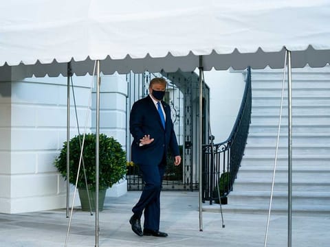 US President Donald Trump departs the White House in Washington en route to Walter Reed National Military Medical Center in Bethesda, Md. where he will be treated for the coronavirus. 