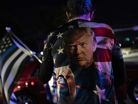 Supporters of US President Donald Trump rally outside Walter Reed National Military Medical Center on October 3, 2020 in Bethesda, Maryland. 