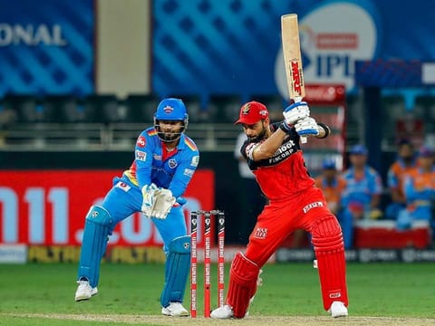 Royal Challengers Bangalore skipper Virat Kohli plays a shot during the  match against Delhi Capitals.