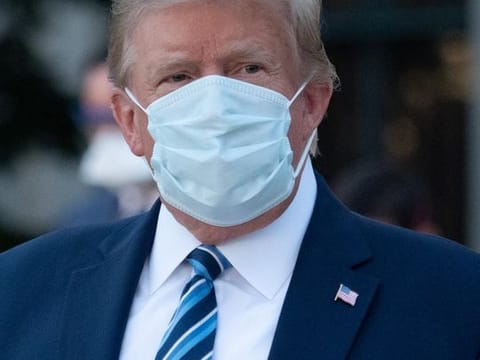 US President Donald Trump leaves Walter Reed Medical Center in Bethesda, Maryland.