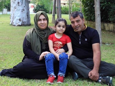 Sama with her parents
