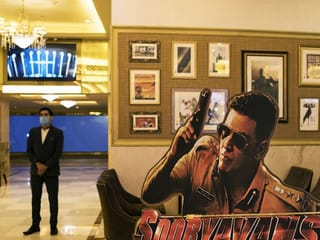 Photos: Indian cinemas reopen after going dark for months amid virus