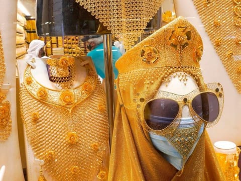 Gold prices are flaming hot, rocketing past $2,000 an ounce in the hours after President Trump's arrest. Other factors to do with US economy could add to volatlity.