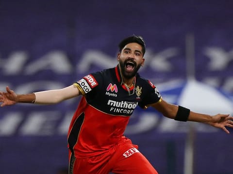 Mohammed Siraj of the Royal Challengers Bangalore celebrates the wicket of Nitish Rana of the Kolkata Knight Riders in the IPL 2020 game in Abu Dhabi on Wednesday. 