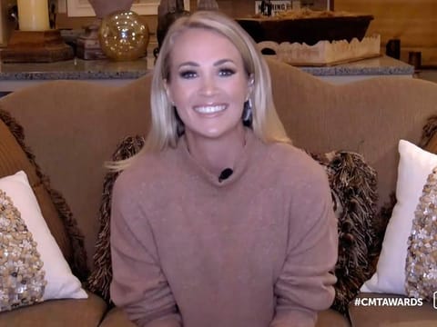 Carrie Underwood accepts the video of the year award for  "Drinking Alone"during the Country Music Television awards airing on Wednesday, Oct. 21, 2020.