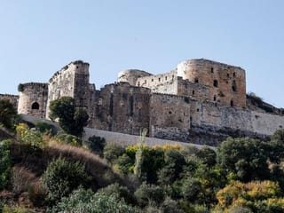 Photos: Syrians spruce up famed Crusader castle after years of war