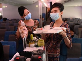 Photos: Travel-starved 'passengers' dine on parked Singapore Airlines jet
