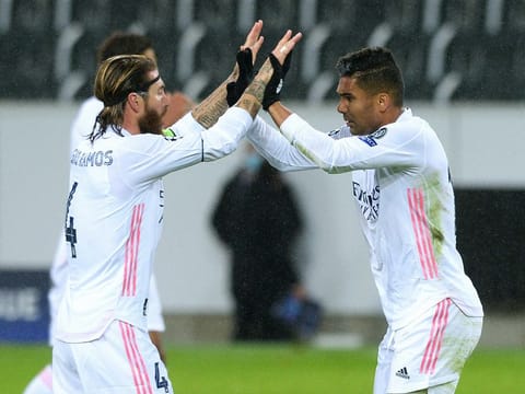 Real Madrid's Casemiro celebrates scoring their second goal with Sergio Ramos.