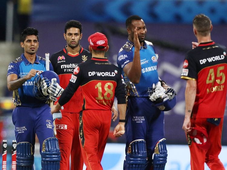 Mumbai and Bangalore players greet each other 