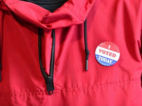 A voter wears an "I VOTED TODAY" sticker after casting his ballot at the Philadelphia City Hall satellite polling station on October 27, 2020 in Philadelphia, Pennsylvania. 