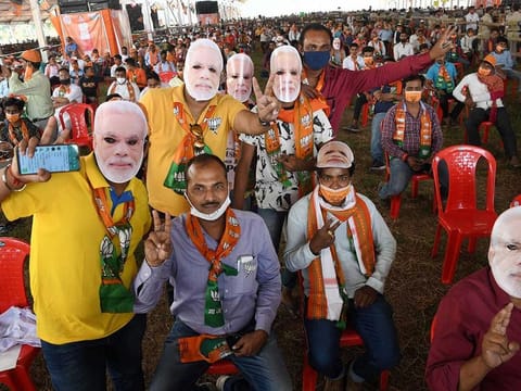 BJP supporters during a rally by Prime Minister Narendra Modi