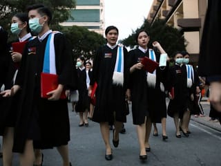 Photos: Protesting Thai students boycott royal graduation day