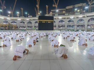 In photos: Thousands of international pilgrims perform a socially distant Umrah in Saudi Arabia