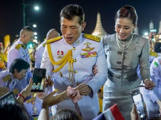 Photos: Thai king and queen take to street to meet adoring royalists
